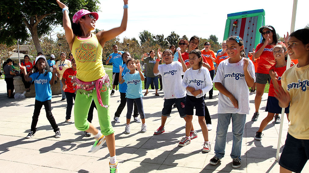 Zumba instructor at Jamboree Day encouraging health and fitness
